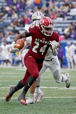 Warner Robins running back Malcom Brown (24) scores a receiving touchdown against Carterville in the first half during the first half of the Class 5A state high school football final at Center Parc Stadium Wednesday, December 30, 2020 in Atlanta. JASON GETZ FOR THE ATLANTA JOURNAL-CONSTITUTION