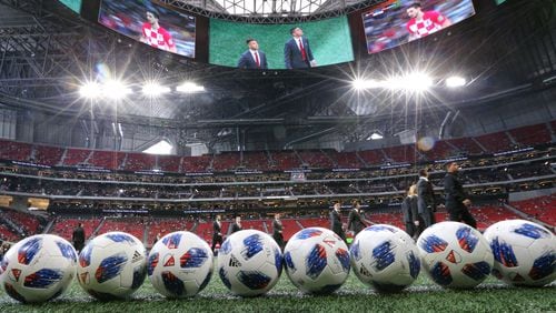 Atlanta United players take in the World Cup final on the halo board as they arrive in Mercedes-Benz Stadium to play the Seattle Sounders in a MLS soccer game on Sunday, July 15, 2018, in Atlanta.     Curtis Compton/ccompton@ajc.com