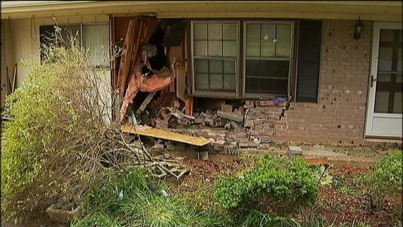 A pick-up truck driver died May 19, 2014, after crashing into a Clayton County home.
