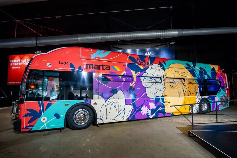 The exhibit includes a MARTA bus decorated inside and out by Sanithna Phansavanh. Photo: Courtesy of Science Gallery Atlanta