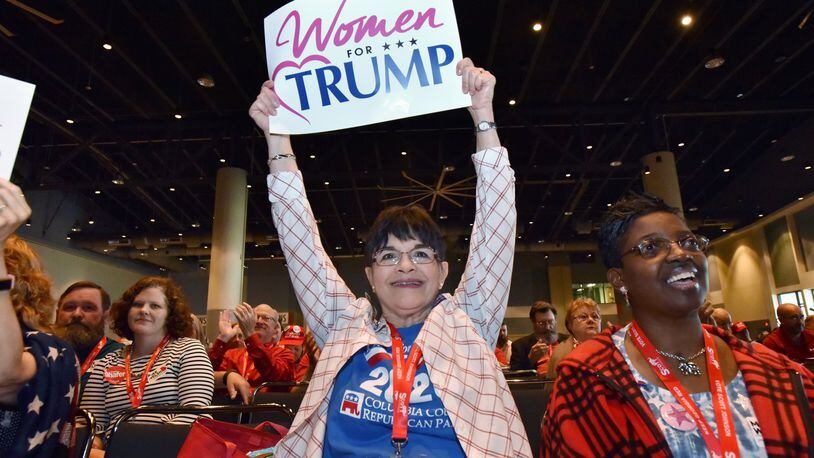 Priscilla Bence holds a sign to support during 2019 Georgia GOP state convention in Savannah. HYOSUB SHIN / HSHIN@AJC.COM