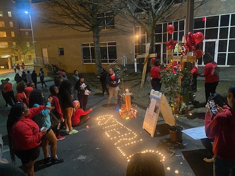Clark Atlanta University students held several vigils Wednesday to pay tribute to sophomore Jatonne Sterling, who was fatally shot near campus on Tuesday. On Wednesday, some students gathered by the Catholic campus ministry building outside which the shooting took place. (Courtesy of Rudy Schlosser)