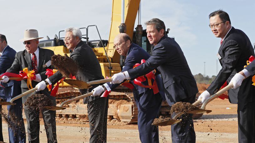 Kim Jun (from left), SK Innovation CEO, U.S. Secretary of Commerce Wilbur Ross, Gov. Brian Kemp, and Chey Jae won, SK Executive Vice Chairman, joined in a groundbreaking ceremony on March 19, 2019 for an SK automotive battery plant in Jackson County. The Korean plant represents one of the largest economic development projects in the state’s history. Bob Andres / bandres@ajc.com