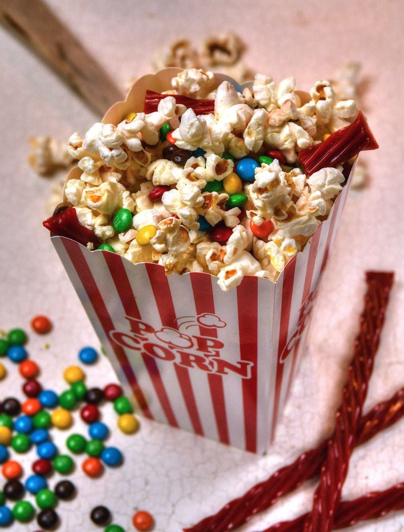 With Deluxe Movie Night Popcorn, you can add your favorite concession snack. (Styling by Susan Puckett / Chris Hunt for the AJC)