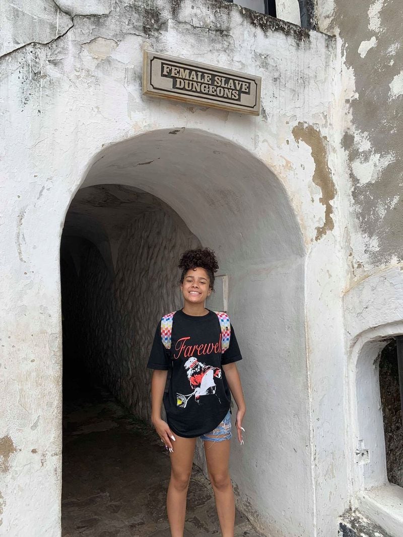 Korleki Kisseih outside of the Female Slave Dungeon at Elmina Castle.