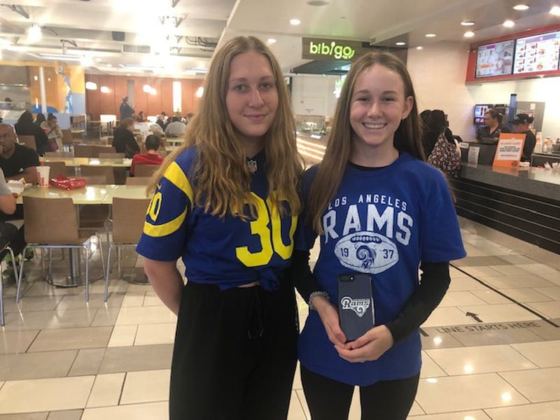Sisters Isabella Smith (right) and Gabriella Smith are Rams fans and will attend Super Bowl LIII in Atlanta. Here they are taking a break from shopping with their Mom on Tuesday at  Westfield Mall in Culver City, Ca. (By D. Orlando Ledbetter/dledbettter@ajc.com)
