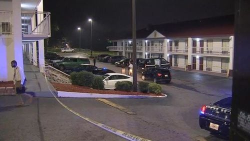 A man killed in an DeKalb County motel shooting was in an argument with the suspected shooter.
