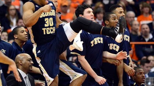 Georgia Tech's Corey Heyward (30) and his teammates react during the second half against Syracuse in an NCAA college basketball game in Syracuse, N.Y., Tuesday, March 4, 2014. Georgia Tech won 67-62. (AP Photo/Kevin Rivoli) Georgia Tech's Corey Heyward (30) and his teammates react during the second half against Syracuse in an NCAA college basketball game in Syracuse, N.Y., Tuesday, March 4, 2014. Georgia Tech won 67-62. (Kevin Rivoli / AP)