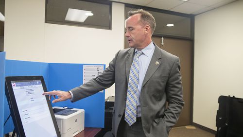 09/16/2019 -- Atlanta, Georgia -- Chris Harvey, director of elections division for the Georgia Secretary of State, shows off the new Georgia voting machines during a demonstration at the James H. "Sloppy" Floyd building in Atlanta, Monday, September 16, 2019. (Alyssa Pointer/alyssa.pointer@ajc.com)