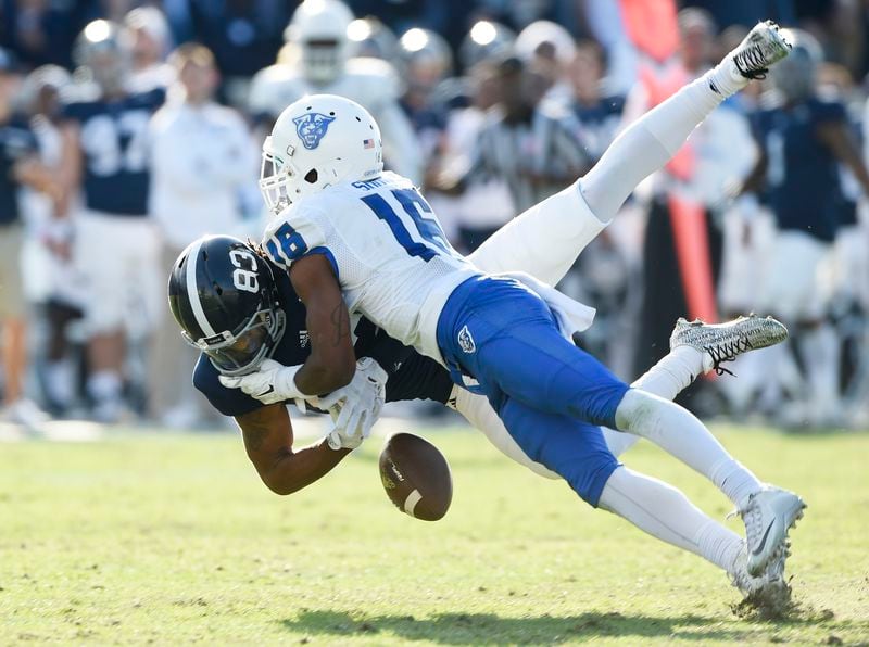STATESBORO, GA - DECEMBER 5:  Wide receiver Keigan Williams #83 of the Georgia Southern Eagles has a reception broken up by cornerback Jerome Smith #16 of the Georgia State Panthers during the second quarter on December 5, 2015 at Paulson Stadium in Statesboro, Georgia.  (Photo by Todd Bennett/Getty Images)