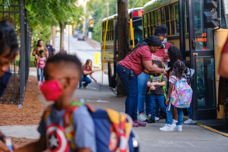 Students arrive for the first day of school at Hope-Hill Elementary School in Atlanta on Monday, Aug. 1, 2022. (Arvin Temkar / arvin.temkar@ajc.com)
