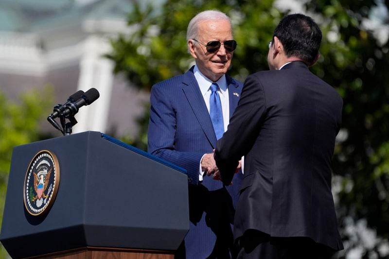 President Joe Biden and Japanese Prime Minister Fumio Kishida shake hands during a State Arrival Ceremony on the South Lawn of the White House, Wednesday, April 10, 2024, in Washington. (AP Photo/Evan Vucci)