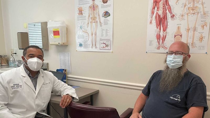 Newnan primary care physician Dr. Cecil Bennett, left, and one of his patients, Nathan Bridges. Bridges is now willing to get the COVID-19 vaccine after talking to Bennett. PHOTO CONTRIBUTED.