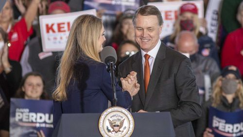 Trump signs pandemic bill that put Georgia’s senators in vexing spot