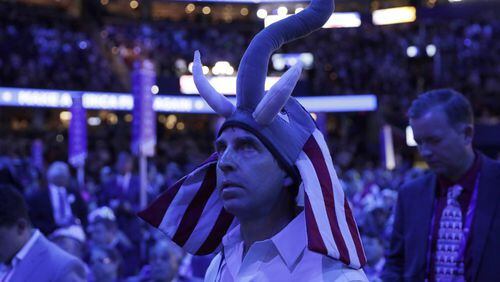 Jim Walsh from Connecticut watches as Sen. Ted Cruz, R-Tex., speaks during the third day session of the Republican National Convention in Cleveland on Wednesday. (AP/Matt Rourke)