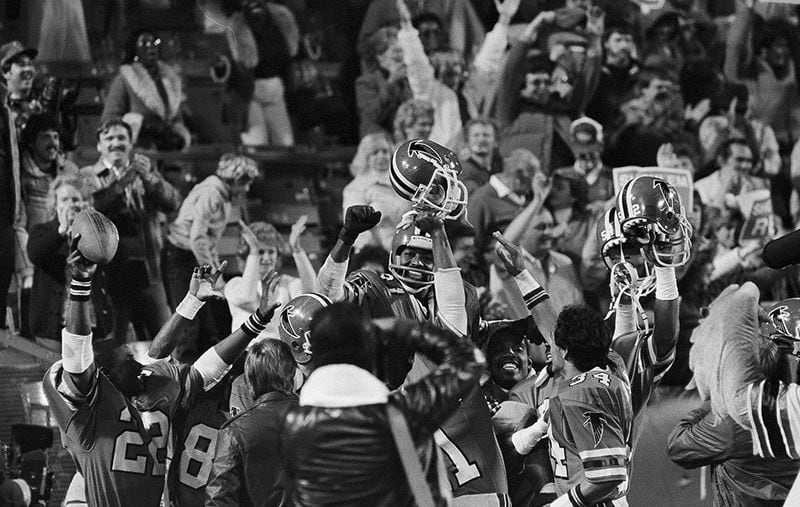 A "Big Ben" desperation pass caught by Willy "White Shoes" Johnson gave the Atlanta Falcons a victory over the San Francisco 49ers and a ride atop teammates' shoulders for Johnson in Atlanta, Nov. 21, 1983. The pass from Steve Bartkowski in the final two seconds won, 28-24. (Charles Kelly/AP)