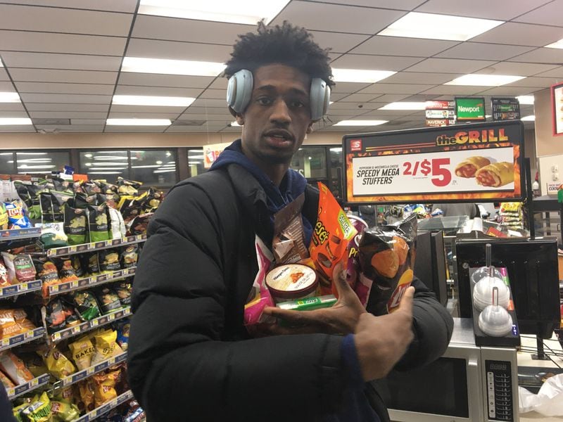 Georgia Tech forward Khalid Moore displays his selections at a Speedway gas station in Winston-Salem, N.C., February 19, 2020. (Ken Sugiura/AJC)