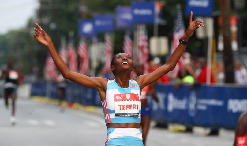 Senbere Teferi is the winner in the Woman's Elite division of the 53rd running of the Atlanta Journal-Constitution Peachtree Road Race in Atlanta on Monday, July 4, 2022. (Curtis Compton / Curtis.Compton@ajc.com)