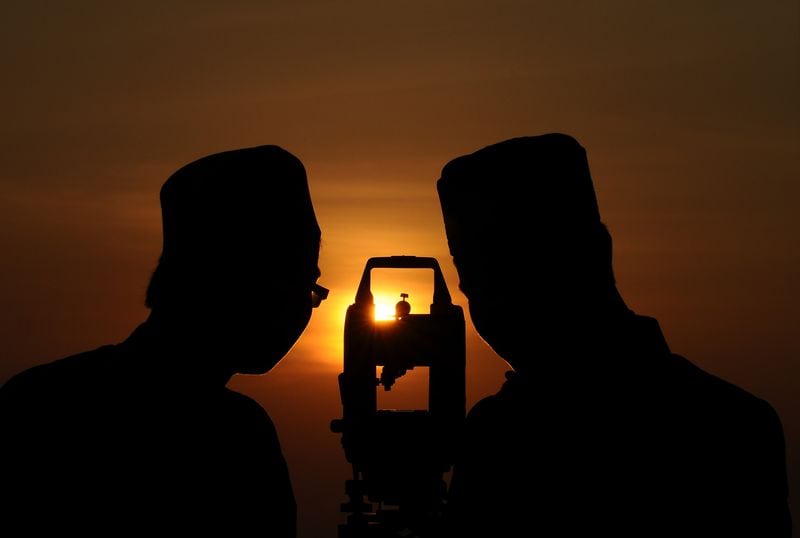 Indonesian Muslims hold a Rukyatul Hilal to see the new crescent moon that determines the end of Ramadan.