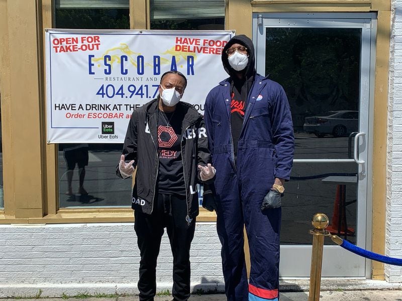 Co-owners of Escobar Lounge Mychel "Snoop" Dillard and rapper 2Chainz personally helped serve meals to the homeless after deciding not to reopen their restaurant on April 27. COURTESY OF ESCOBAR LOUNGE