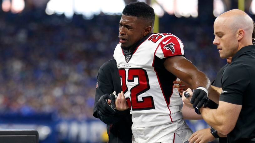 INDIANAPOLIS, INDIANA - SEPTEMBER 22: Keanu Neal #22 of the Atlanta Falcons is helped off the field during the second quarter in the game against the Indianapolis Colts at Lucas Oil Stadium on September 22, 2019 in Indianapolis, Indiana. (Photo by Justin Casterline/Getty Images)