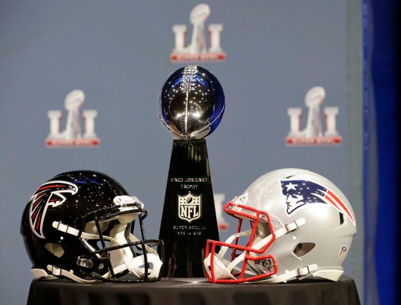 The Vince Lombardi Trophy is seen before NFL Commissioner Roger Goodell's news conference during preparations for the NFL Super Bowl 51 football game Wednesday, Feb. 1, 2017, in Houston. (AP Photo/David J. Phillip)