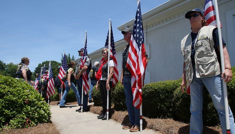 June 2012 -- Members of the Patriot Guard of Henry County stand in line at the entrance to the visitation at McDonough's Haisten Funeral Home for PFC Brandon Goodine. VINO WONG / VWONG@AJC.COM
