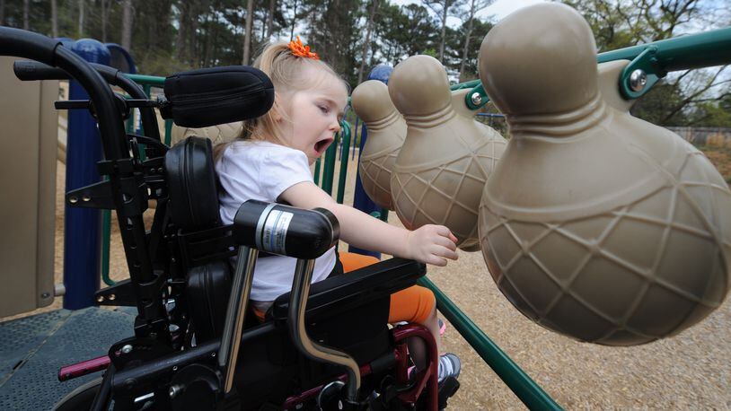Public spaces such as this playground in Austell offer greater accessibility to people with disabilities.  (Photo Credit: Johnny Crawford/AJC)