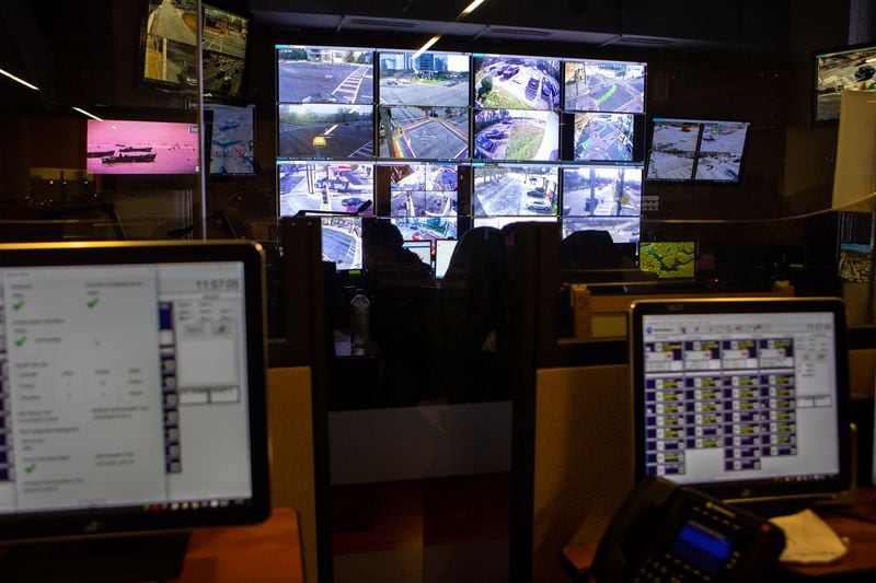 The Video Integration Center, which monitors security cameras across the city, is shown from the main floor of Atlanta's 911 call center on Wednesday, Dec. 23, 2020. (Casey Sykes for The Atlanta Journal-Constitution)