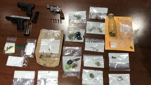 Drugs and guns confiscated at a house party on Dec. 31. Photo provided  by the Bartow-Cartersville Drug Task Force