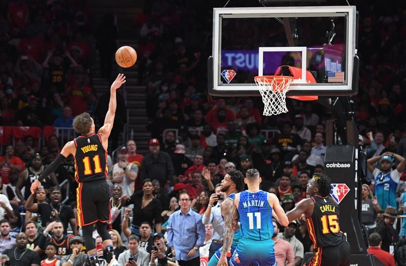 Hawks guard Trae Young (11) goes up for a shot during the second half in the NBA play-in tournament at State Farm Arena on Wednesday, April 13, 2022.  (Hyosub Shin / Hyosub.Shin@ajc.com)