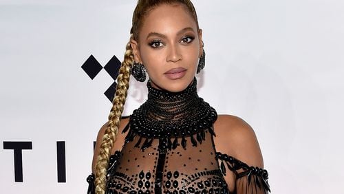 FILE - In this Oct. 15, 2016, file photo, singer Beyonce Knowles attends the Tidal X: 1015 benefit concert in New York. Beyonce brought her star power to a pre-wedding party for the daughter of India’s richest mogul. Beyonce performed Sunday, Dec. 9, 2018, and sang some of her hits such as “Crazy In Love” and “Perfect.” Guests included Hillary Clinton and a host of Bollywood stars in the historic Indian city of Udaipur. (Photo by Evan Agostini/Invision/AP, File) ORG XMIT: NYAG102