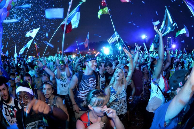September 27, 2014 Chattahoochee Hills - A crowd dances to electronic beats at the TomorrowWorld electronic music festival in Chattahoochee Hills, South of Atlanta, on Saturday, September 27, 2014. The event has been the world's most popular electronic music festival in Europe for years. It takes about three weeks to transform the 350-acres of farm land at Bouckaert Farm in Chattahoochee Hills into the self-contained EDM haven known as TomorrowWorld.The three-day fest officially kicked off at noon Friday and the pulsing bass won't cease until the early hours of Monday morning. HYOSUB SHIN / HSHIN@AJC.COM TomorrowWorld revelers feel the beat. HYOSUB SHIN / HSHIN@AJC.COM