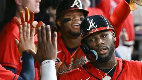 Braves center fielder Michael Harris (foreground) and right fielder Ronald Acuña (background) might have more to celebrate at season's end. (Hyosub Shin / Hyosub.Shin@ajc.com)