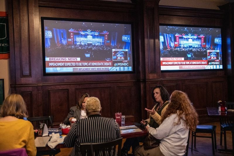 111419 NORCROSSâ€” Gwinnett Democrats gather to watch the presidential debates held in Atlanta Wednesday, November 20, 2019 at Mazzyâ€™s Sports Bar in Norcross, Ga. PHOTO BY ELISSA BENZIE