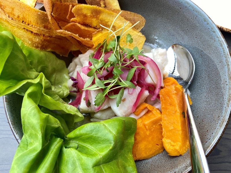 A closeup of El Vinedo Local’s Victoriano ceviche — fresh white fish, sweet potatoes and onion, with ultra-thin and crispy plantain chips.
Wendell Brock for The Atlanta Journal-Constitution