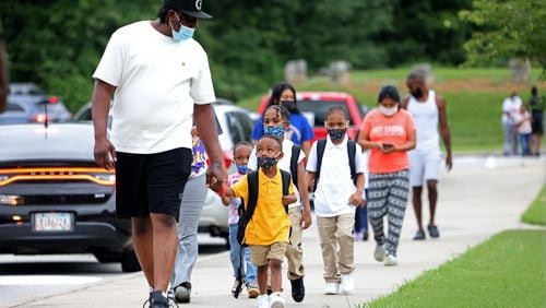 Thousands of metro Atlanta kids are about to go back to school. With Georgia sweltering in temperatures in the 90s, the opening of classes Tuesday in Atlanta, Cherokee, Cobb, Decatur and Rockdale seems all the harder. Those districts will be joined Wednesday by Buford, Clarke, Clayton, Douglas, Gwinnett, Henry, Marietta and Oconee. Fayette and Forsyth start Thursday, while DeKalb and Fulton resume Aug. 7. (Jason Getz / AJC file photo 2022)