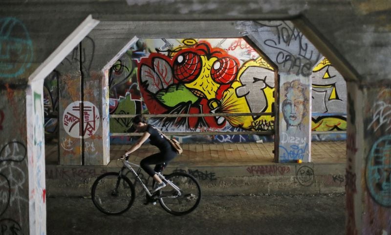 The vibrant walls of the Krog Street Tunnel are ever-changing with various artists making contributions. BOB ANDRES /BANDRES@AJC.COM