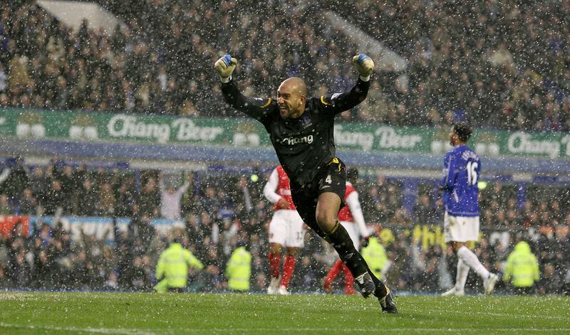 FILE - Everton's American goalkeeper Tim Howard celebrates their victory against Arsenal during their English Premier League soccer match at Goodison Park Stadium in Liverpool, England, March 18, 2007. Tim Howard will join Tony Meola, Kasey Keller and Brad Friedel on Saturday as modern-era American goalkeepers in the U.S. National Soccer Hall of Fame. (AP Photo/Dave Thompson, File)