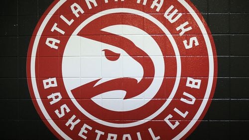 102715 ATLANTA: -- A new Hawks logo is painted on the tunnel wall leading out to the court for the first regular season basketball game "home opener" on Tuesday, Oct. 27, 2015, in Atlanta.  Curtis Compton / ccompton@ajc.com