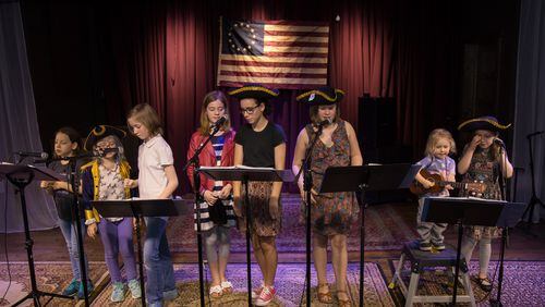 Kids fill the stage during the all-ages sing-through during the Hamiltunes ATL at the Vista Room in Decatur on April 22. CONTRIBUTED BY STEVE SCHAEFER