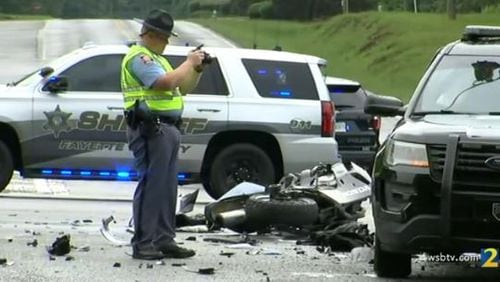 A motorcycle rider was killed after slamming into a patrol vehicle Friday afternoon in Tyrone. Georgia State Patrol troopers investigated the crash.
