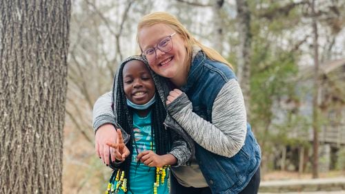 Allie Reeser has formed tight bonds with the refugee children living in Willow Branch, an Atlanta-area apartment complex. (Star-C)