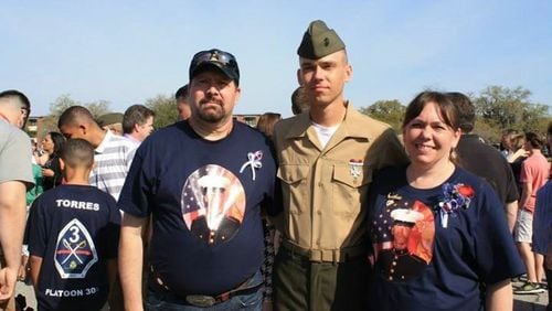 Private First Class Kyle Bowersox with his parents, Kevin and Lynette. (Courtesy: Bowersox family)