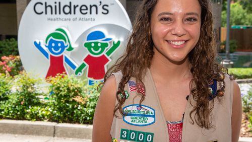 Catherine Friedline stands outside Children's Healthcare of Atlanta in Sandy Springs on Wednesday May 26th. She is a Girl Scout who created Troop Hope for CHOA hospitals, a Girl Scout program for long-term care patients. PHIL SKINNER FOR THE ATLANTA JOURNAL-CONSTITUTION.