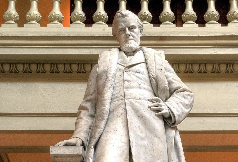 This statue of Benjamin Harvey Hill stands inside the Georgia Capitol. (Chris Hunt/ Special to the AJC)