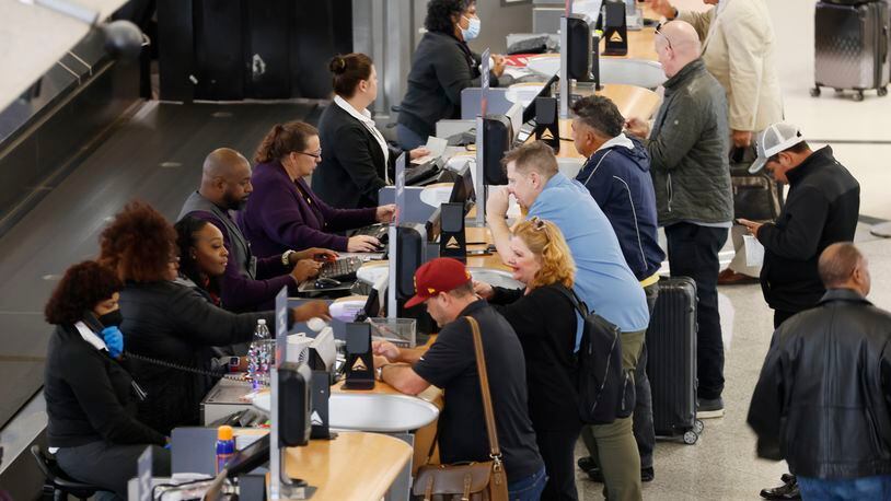 Travelers line up at Delta check-in counters at Hartsfield-Jackson Atlanta International Airport on Thursday, October 27, 2022. Miguel Martinez / miguel.martinezjimenez@ajc.com