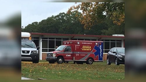 Officials respond after an employee attempted suicide at Towers High School.