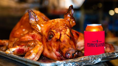 A whole pig can be ordered in advance for large groups at Porch Light Latin Kitchen. CONTRIBUTED BY HENRI HOLLIS