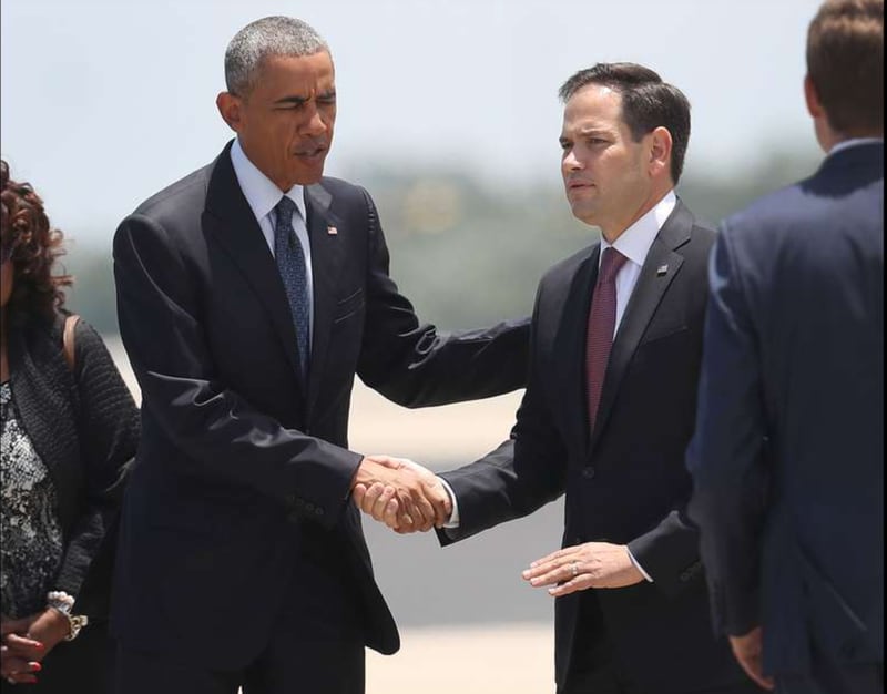 President Barack Obama shakes hands with Sen. Marco Rubio (R-FL) after they arrive at the Orlando International Airport to visit with family and community members after the attack at the Pulse gay nightclub where Omar Mateen killed 49 people on June 16, 2016 in Orlando, Florida. The mass shooting on June 12th killed 49 people and injured 53 others in what is the deadliest mass shooting in the country's history. (Photo by Joe Raedle/Getty Images)